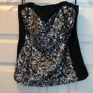 Black and silver sequined Bebe strapless corset